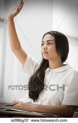 Girl with hands raised View Large Photo Image Stock Photo - Girl with hands raised. Fotosearch