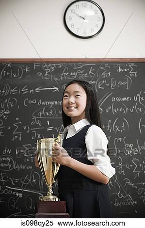 Stock Photography - Girl with trophy. Fotosearch