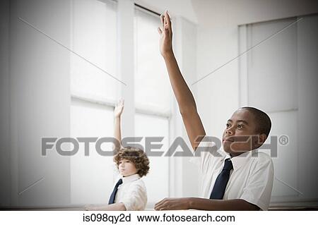 School students with hands raised View Large Photo Image Stock Image - School students with hands raised. Fotosearch