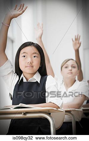 School students with hands raised View Large Photo Image Stock Image - School students with hands raised. Fotosearch