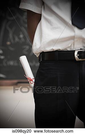 Student with scroll in pocket View Large Photo Image Stock Image - Student with scroll in pocket. Fotosearch