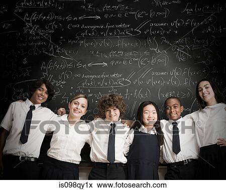 Stock Photo - Students in front of blackboard. Fotosearch