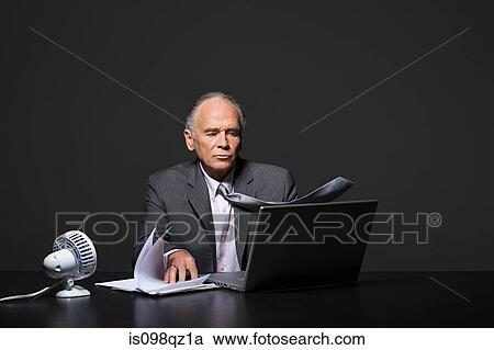 Businessman with fan View Large Photo Image Stock Image - Businessman with fan. Fotosearch
