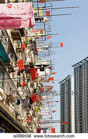 Stock Photo - Apartment building with laundry. Fotosearch
