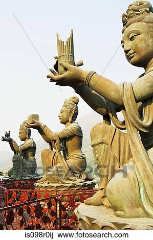 Statues near tian tan buddha View Large Photo Image Stock Image - Statues near tian tan buddha. Fotosearch