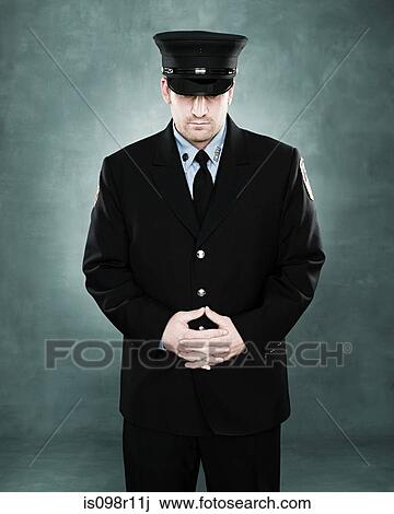 Stock Image - Portrait of a firefighter. Fotosearch