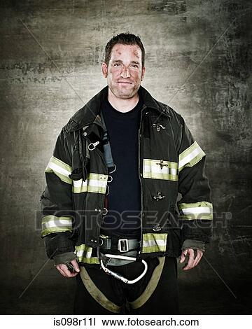 Stock Image - Portrait of a firefighter. Fotosearch