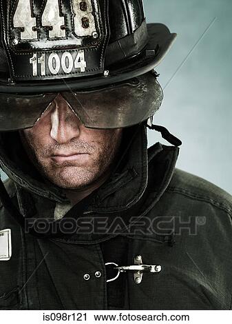 Stock Image - Portrait of a firefighter. Fotosearch