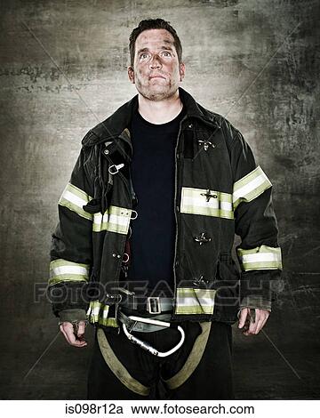 Stock Image - Portrait of a firefighter. Fotosearch