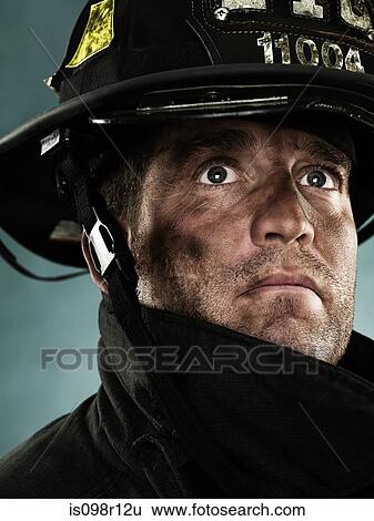 Portrait of a firefighter View Large Photo Image Stock Photograph - Portrait of a firefighter. Fotosearch