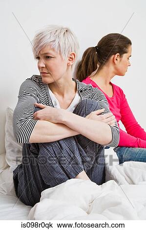 Stock Image - A lesbian couple arguing. Fotosearch