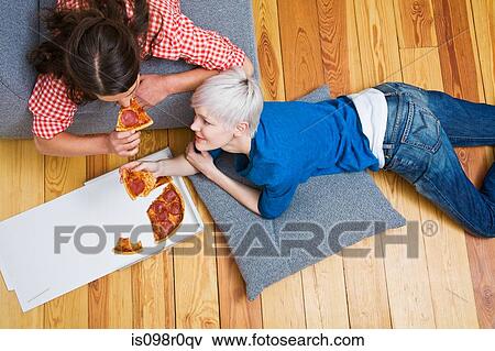 A lesbian couple having pizza View Large Photo Image Stock Photo - A lesbian couple having pizza. Fotosearch