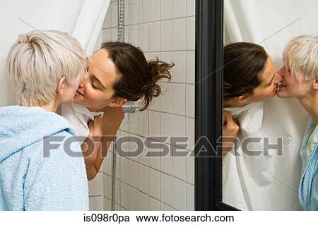 A lesbian couple kissing View Large Photo Image Stock Image - A lesbian couple kissing. Fotosearch