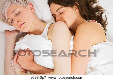 A lesbian couple sleeping View Large Photo Image Stock Photo - A lesbian couple sleeping. Fotosearch