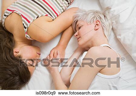 A lesbian couple sleeping View Large Photo Image Stock Photo - A lesbian couple sleeping. Fotosearch