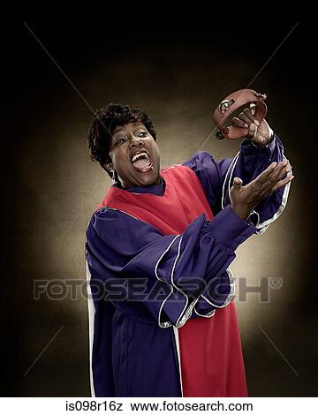 A gospel singer singing View Large Photo Image Stock Photo - A gospel singer singing. Fotosearch