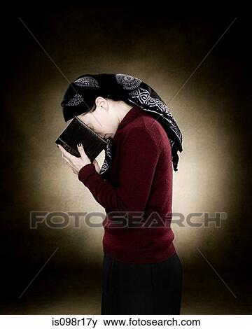 A jewish woman praying View Large Photo Image Stock Photo - A jewish woman praying. Fotosearch