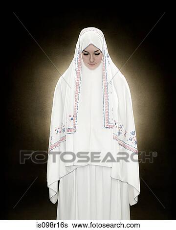 Stock Photograph - Portrait of a young muslim woman. Fotosearch
