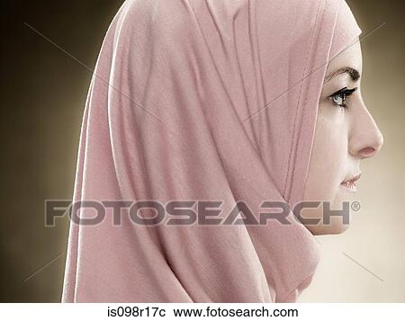 Stock Image - Profile of a young muslim woman. Fotosearch
