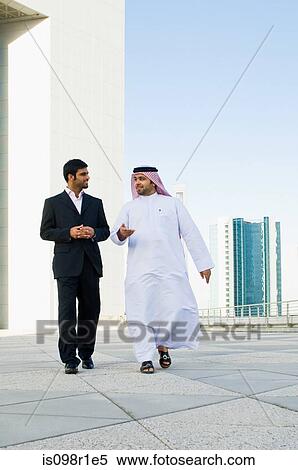 Businessman on a skyscraper View Large Photo Image Stock Photography - Businessman on a skyscraper. Fotosearch