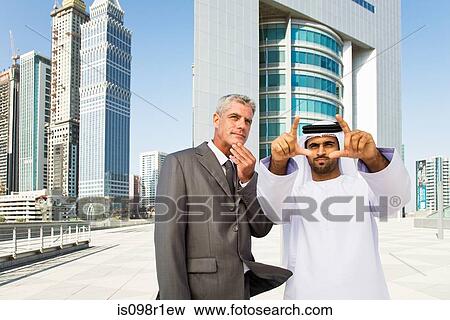 Businessmen in dubai View Large Photo Image Stock Photo - Businessmen in dubai. Fotosearch
