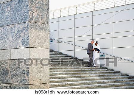 Businessmen on steps View Large Photo Image Stock Image - Businessmen on steps. Fotosearch