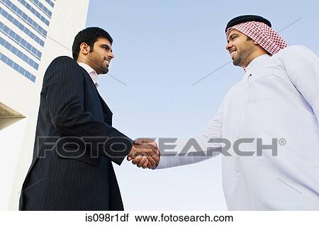 Businessmen shaking hands View Large Photo Image Stock Image - Businessmen shaking hands. Fotosearch