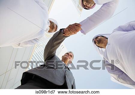 Businessmen shaking hands View Large Photo Image Stock Photo - Businessmen shaking hands. Fotosearch