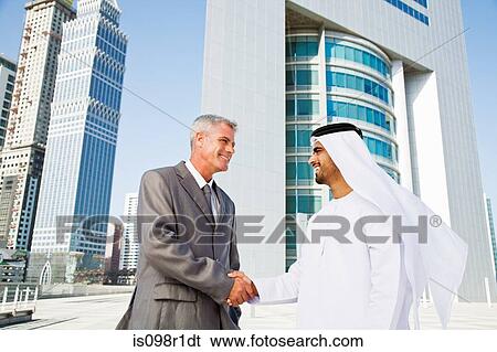 Businessmen shaking hands View Large Photo Image Stock Photograph - Businessmen shaking hands. Fotosearch