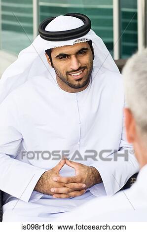 Businessmen talking View Large Photo Image Stock Image - Businessmen talking. Fotosearch