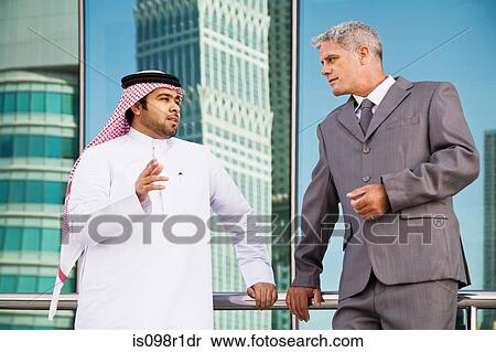 Businessmen talking View Large Photo Image Stock Photography - Businessmen talking. Fotosearch
