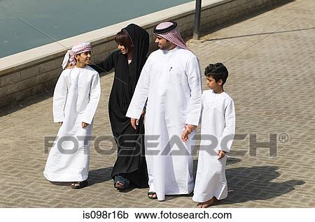 A family going for a walk View Large Photo Image Stock Image - A family going for a walk. Fotosearch