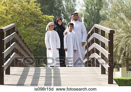Stock Image - A family on a bridge. Fotosearch