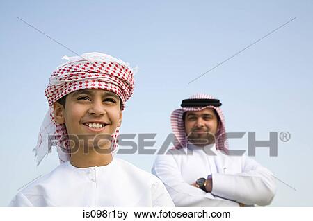Stock Photo - A portrait of a father and son. Fotosearch