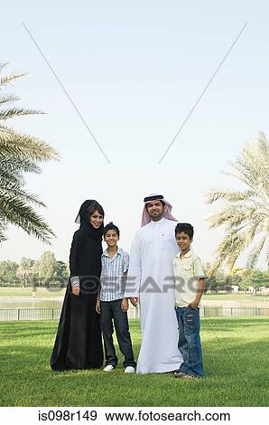 Portrait of a family in a park View Large Photo Image Stock Photo - Portrait of a family in a park. Fotosearch
