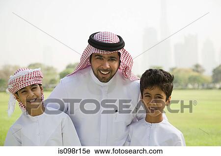Portrait of a father with his sons View Large Photo Image Stock Image - Portrait of a father with his sons. Fotosearch