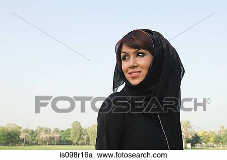Portrait of a woman wearing a hijab View Large Photo Image Stock Image - Portrait of a woman wearing a hijab. Fotosearch