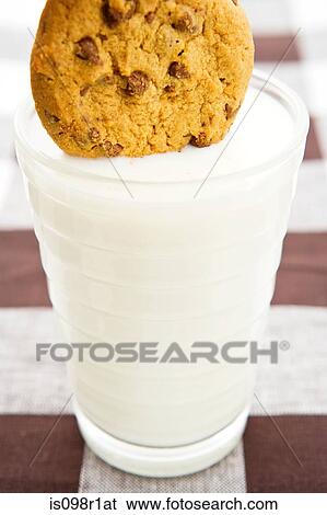A cookie and milk View Large Photo Image Stock Photograph - A cookie and milk. Fotosearch