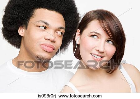 Stock Image - Friends listening to music. Fotosearch