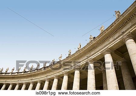 Low angle view of statues in st peters square View Large Photo Image Stock Image - Low angle view of statues in st peters square. Fotosearch