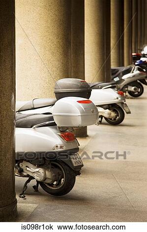 Mopeds in a row View Large Photo Image Stock Image - Mopeds in a row. Fotosearch