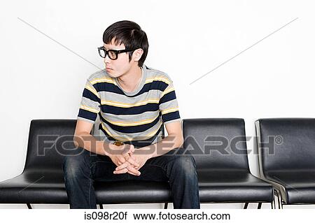 Young man looking away View Large Photo Image Stock Image - Young man looking away. Fotosearch