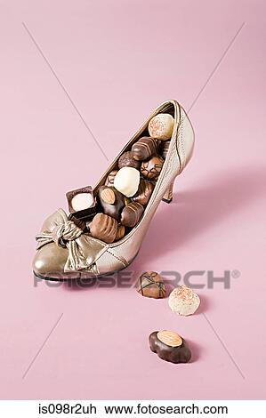 Chocolates in a shoe View Large Photo Image Stock Image - Chocolates in a shoe. Fotosearch