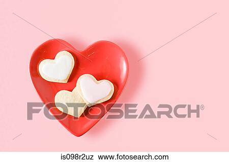Heart shaped biscuits and plate View Large Photo Image Stock Photo - Heart shaped biscuits and plate. Fotosearch