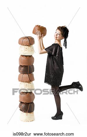 Woman with large chocolates View Large Photo Image Stock Photography - Woman with large chocolates. Fotosearch