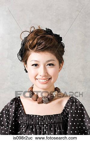 Woman with necklace of chocolates View Large Photo Image Stock Image - Woman with necklace of chocolates. Fotosearch