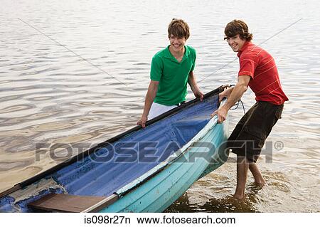 Friends with rowboat View Large Photo Image Picture - Friends with rowboat. Fotosearch