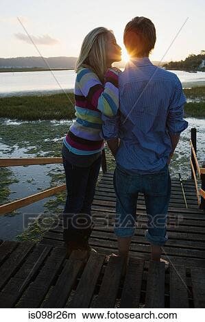Teenage couple at sunset View Large Photo Image Picture - Teenage couple at sunset. Fotosearch