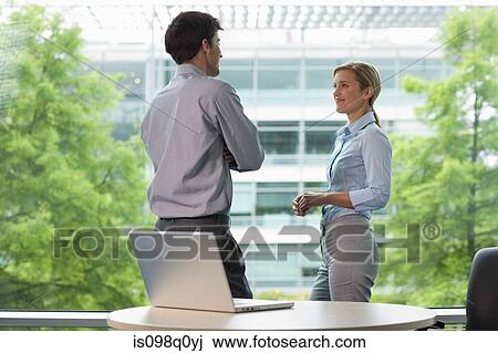 Colleagues in office View Large Photo Image Stock Image - Colleagues in office. Fotosearch
