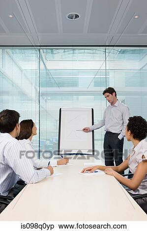 Stock Photography - Man giving presentation. Fotosearch